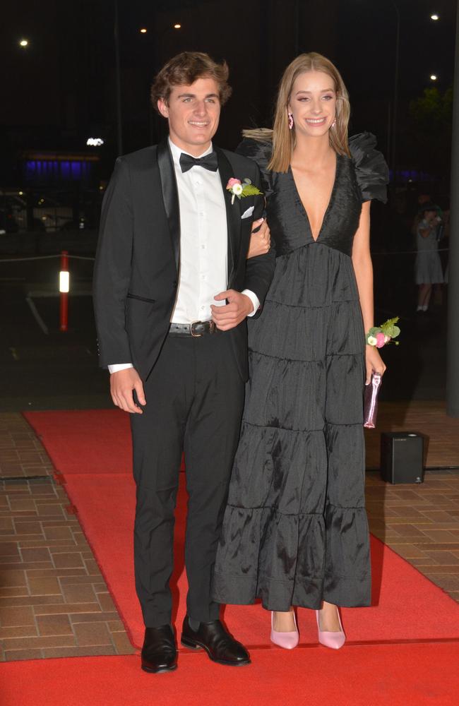 Toowoomba school formals. At the 2023 St Ursula's College formal is graduate Ava Wells with her partner Isaac Burke. Picture: Rhylea Millar