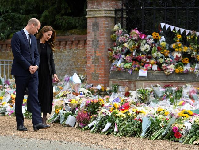 Prince William and Catherine, Princess of Wales view floral tributes outside Norwich Gate on the Sandringham Estate. Picture: AFP