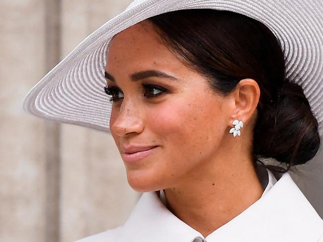 Meghan, Duchess of Sussex, chose an outfit and accessories that contained messages of reference to the late Princess Diana. Picture: AFP