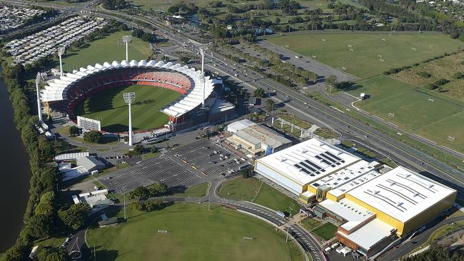 An aerial view of the Carrara Stadium (left) and the Carrara Sports and Leisure Centre (right). (AAP Image/Dave Hunt) 