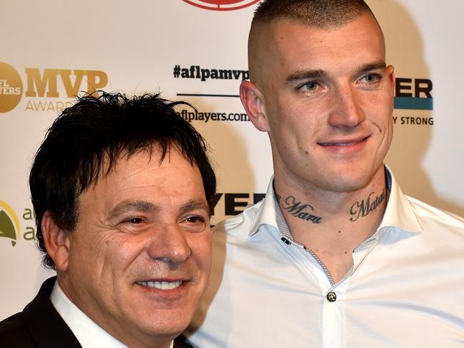 AFL MVP awards at the Peninsula Room at Docklands. Dusty Martin with his manager Ralph Carr after he wins.  Picture: Jay Town