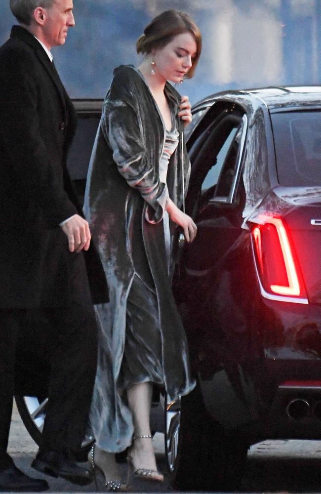 Emma Stone arrives at Jennifer Lawrence and Cooke Maroney's wedding in Newport, Rhode Island. Picture: JosiahW/Backgrid