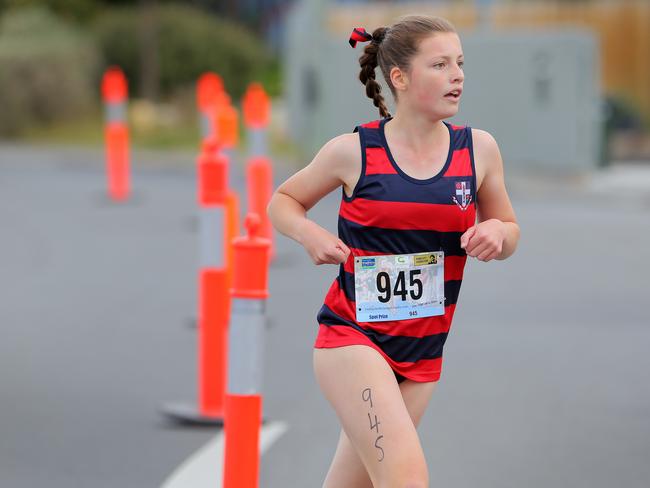 Zia Mitchelmore, of The Friends School, competes in the grade 7 girls individual section of the run leg.