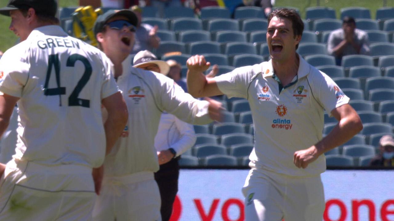 Pat Cummins celebrates the wicket of Virat Kohli.