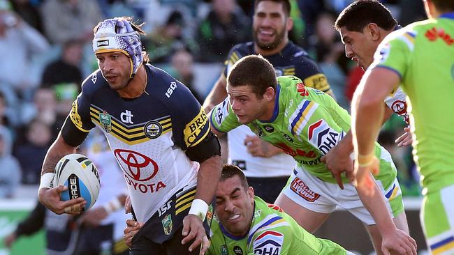 Canberra Raiders vs North Queensland Cowboys at GIO Stadium in Canberra. Cowboys Jonathan Thurston breaks thru