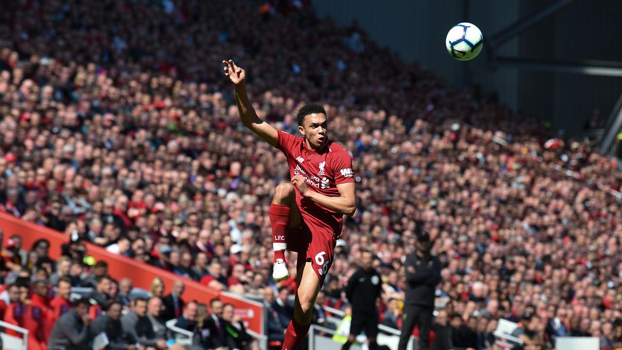 Liverpool's English defender Trent Alexander-Arnold plays the ball