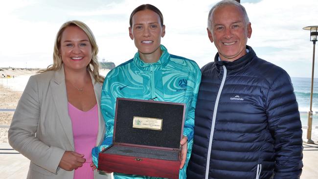 Emily van Egmond getting the keys to the city of Newcastle with dad Gary.