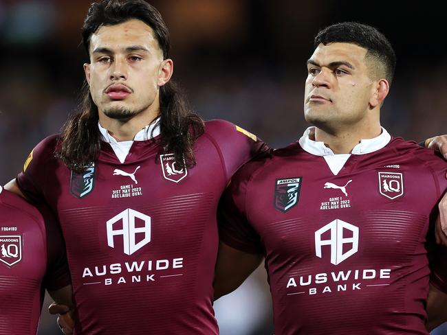 ADELAIDE, AUSTRALIA - MAY 31: Ben Hunt, Tino Fa'asuamaleaui, David Fifita and Reuben Cotter of the Maroons  stand together for the national anthem before game one of the 2023 State of Origin series between the Queensland Maroons and New South Wales Blues at Adelaide Oval on May 31, 2023 in Adelaide, Australia. (Photo by Mark Kolbe/Getty Images)