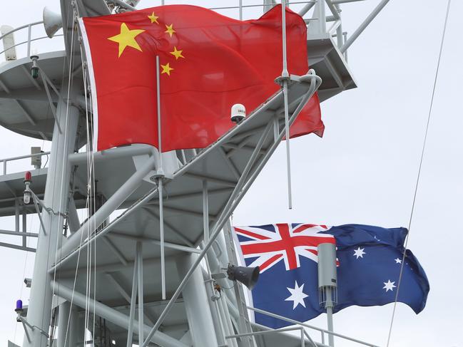 Chinese Naval ships docked at Garden Island in Sydney. With the Australian and Chinese flags flying.