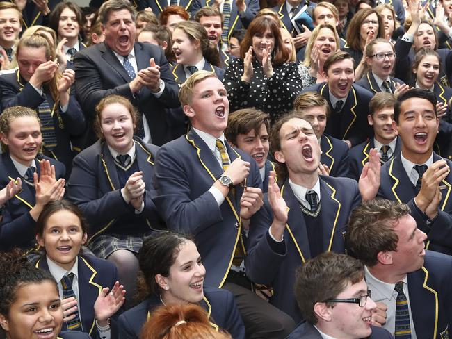 Immanuel College students cheer on schoolmate Kyle Chalmers during the 100m freestyle final. Picture: Sarah Reed