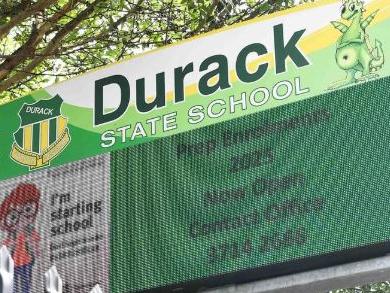 A mother has claimed to have seen three women attacking each other in the carpark of Durack State School on Tuesday afternoon during school pickup.