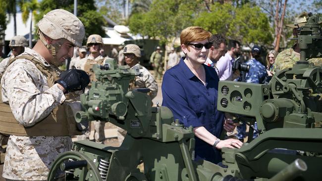 Marise Payne MP, looks over a M777 Howitzer in company with an artillery Marine from Marine Rotation Force - Darwin, during a visit to Robertson Barracks, Darwin. Picture: LSIS James Whittle