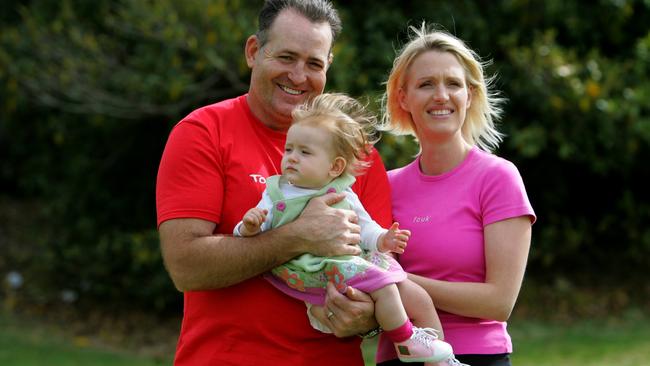 Sienna as a baby with her mum and dad