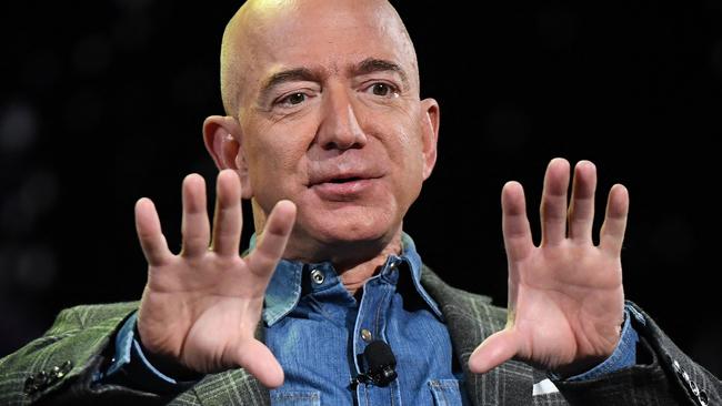 Over the course of 27 years, Jeff Bezos made Amazon.com Inc. into a colossus whose power and influence reverberate across numerous industries. Photo by Mark RALSTON / AFP