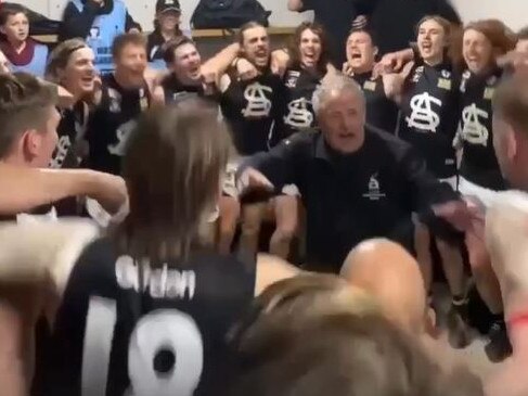 Cliff Grinter sings the song in the rooms with St Albans players. Picture: St Albans FC Instagram