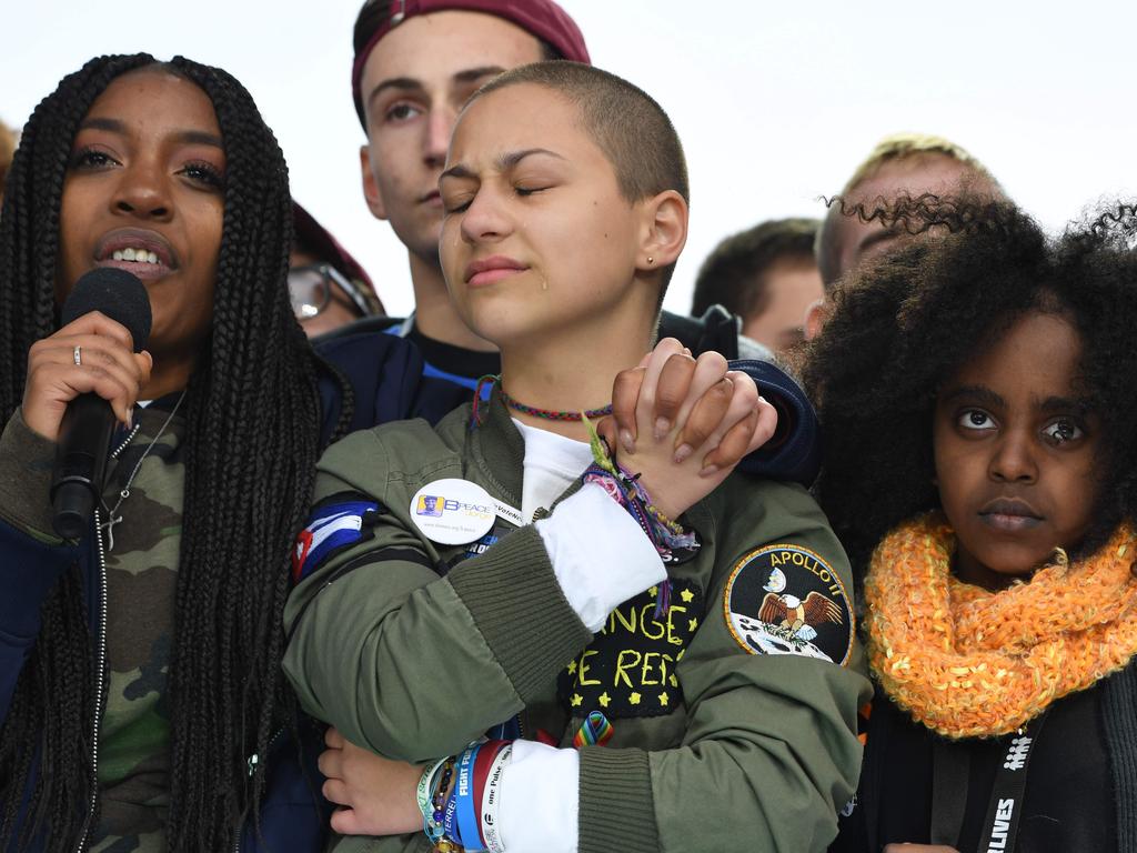 Marjory Stoneman Douglas High School student Emma Gonzalez, centre, listens with other students during the March for Our Lives Rally in Washington, DC, after a massacre at a Florida high school. Picture: AFP