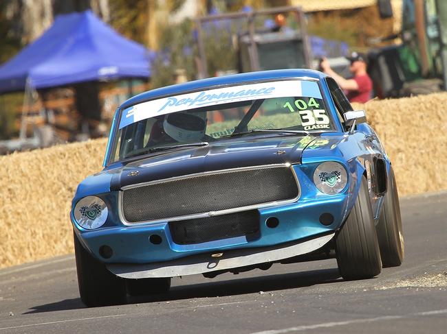 Historic Leyburn Sprints committee president Tricia Chant competing in her all time favourite race car, a blue 1968 Ford Mustang.