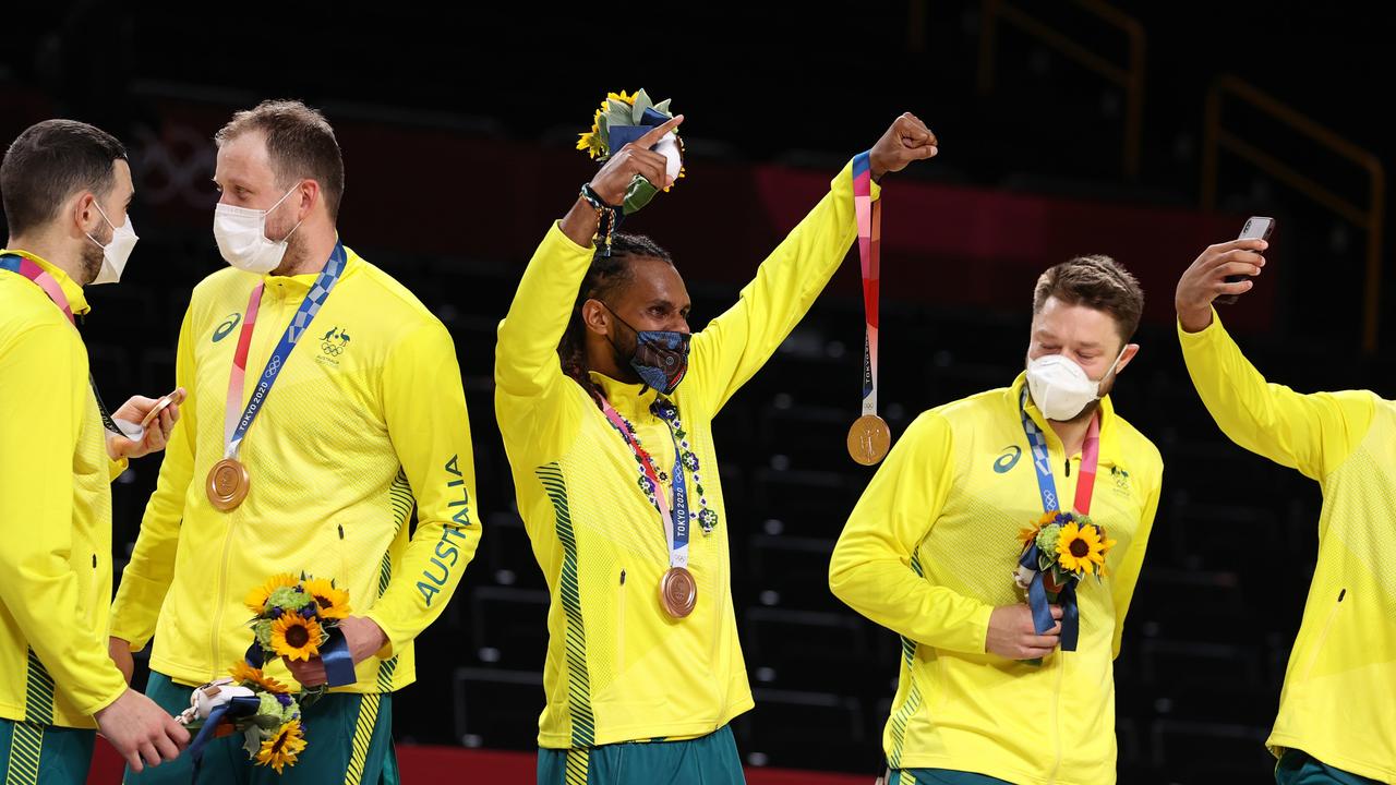 Mills takes over, sends Australia men to first Olympic podium