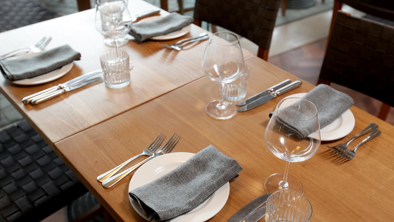 A set table at the new COPPA restaurant in Eagle Street Pier. Picture: Steve Pohlner