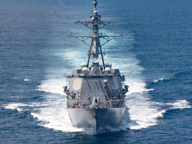 (FILES) In this file handout image courtesy of the US Navy taken on August 27, 2021 the AI Arleigh-burke class guided-missile destroyer USS Kidd (DDG 100) transits the Taiwan Strait during a routine transit. - The United States on September 2, 2022 announced a new $1.1 billion package of arms to Taiwan, vowing to keep boosting the island's defenses as tensions soar with Beijing. The sale comes a month after House Speaker Nancy Pelosi defiantly visited the self-governing democracy, prompting mainland China to launch a show of force that could be a trial run for a future invasion. (Photo by US NAVY / AFP) / RESTRICTED TO EDITORIAL USE - MANDATORY CREDIT "AFP PHOTO / US Navy" - NO MARKETING NO ADVERTISING CAMPAIGNS - DISTRIBUTED AS A SERVICE TO CLIENTS