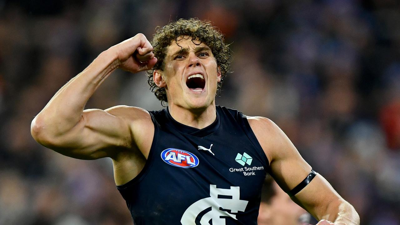 MELBOURNE, AUSTRALIA - JUNE 09: Charlie Curnow of the Blues celebrates kicking a goal during the round 13 AFL match between Essendon Bombers and Carlton Blues at Melbourne Cricket Ground, on June 09, 2024, in Melbourne, Australia. (Photo by Josh Chadwick/Getty Images)