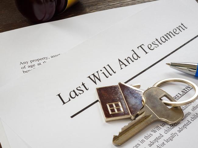 Last will and testament papers and key as symbol of property. ; inheritance, will, estate planning generic