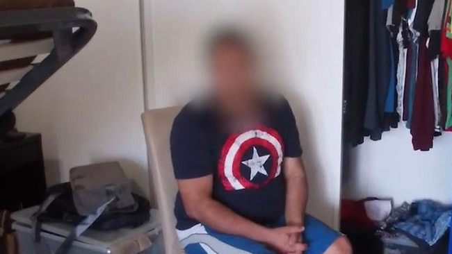 Mubin-ul Haider (pictured, face blurred) has been slapped with a number of fraud-related charges. Picture: Queensland Police