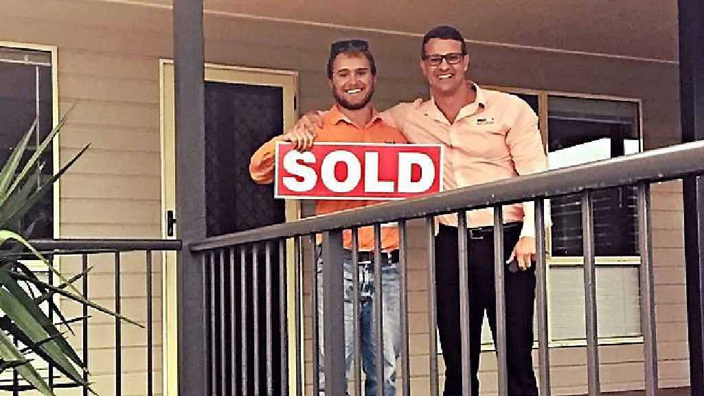 GENERATION SOLD: Tom Searl with real estate agent Adam Cook at his newly purchased Yeppoon property. Tom is one of many in Generation Y buying property. Picture: Contributed