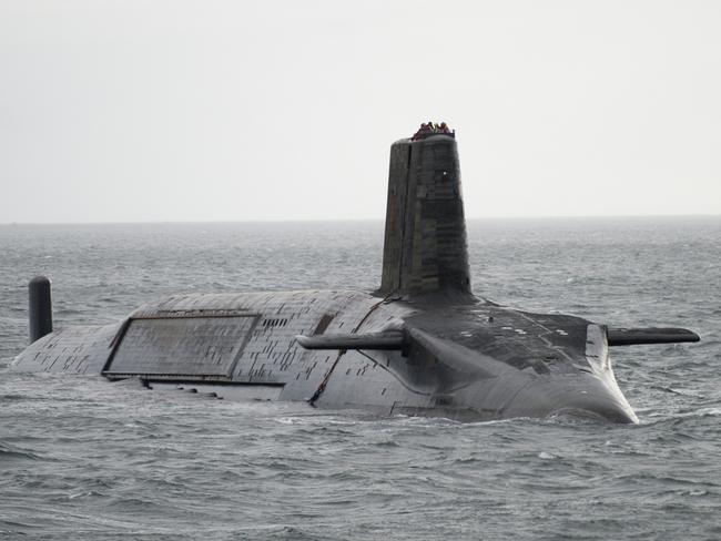 LARGS, SCOTLAND - FEBRUARY 27:  In this handout image provided by MoD Crown Copyright, HMS Vengeance departs for Devonport prior to re-fit on Ferbruary 27, 2012 off the coast of Largs, Scotland. The UK Ministry of Defence has awarded UK's leading naval support business Babcock, on March 25, 2012, with a contract to commence the planning phase for the ÃÂ£350 million GBP refit of Trident ballistic missile submarine HMS Vengeance, which will be undertaken at their Devonport Royal Dockyard. The project to upgrade and refuel the nuclear submarine will safeguard 2,000 UK jobs and will take around three and a half years. River Tamar shipping was suspended when the the 150m-long, 15,900-tonne submarine HMS Vengeance travelled to the Devonport Dockyard ahead of the scheduled refit on March 2, 2012, arriving amid concerns without a signed contract for the refit.  HMS Vengeance will be the last of four Vanguard class submarines to undergo a Lond Overhaul Period and Refuel LOP(R) at Davernport that will commence once HMS Vigilant leaves Devonport on completion of her LOP(R) in 2012. Mandatory Credit: (Photo by Andrew Linnett/MoD Crown Copyright via Getty Images)