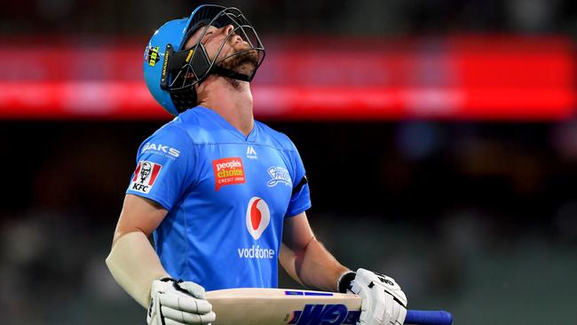 Travis Head throws his head back in disappointment after being dismissed against Hobart on Sunday night. Picture: AAP Image/Sam Wundke