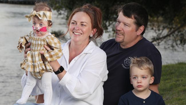 Daisy Stevens, seven months, with parents Debb and Caine, and brother Ollie, 3. Picture: Mater Hospital