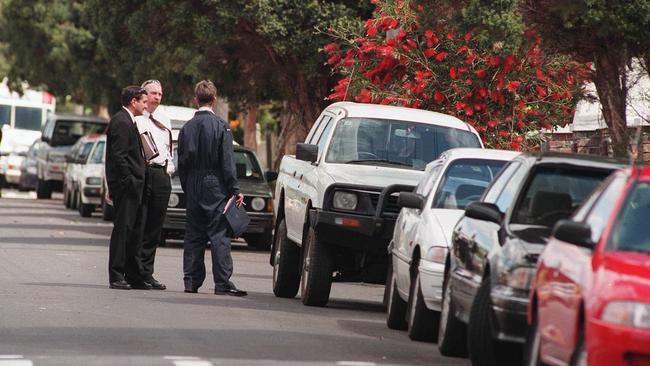 Police inspecting Gerardo Mannella's white ute.