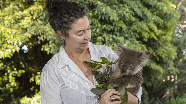 Kangaroo Island Wildlife Network president Kate Welz with a koala at the Kangaroo Island Wildlife Park in Parndana. Picture Simon Cross