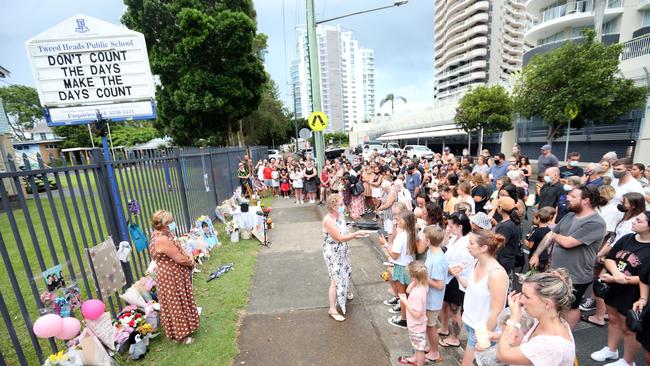 Around 150 people attended the vigil, undeterred by wind and rain. Picture: NCA NewsWire / Richard Gosling