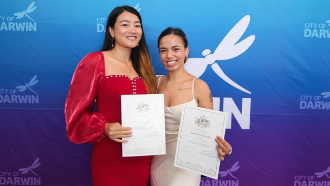 Hmwe Hmwe Kyaw and Hema Giri with their citizenship certificates. Picture: Supplied (George F Photo)