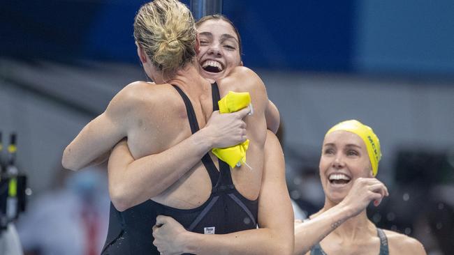 Meg Harris, Bronte Campbell and Emma McKeon of Australia celebrate as Cate Campbell touches the wall for the Australian team in the 4 x 100m Freestyle Relay final gold medal (Photo by Tim Clayton/Corbis via Getty Images)