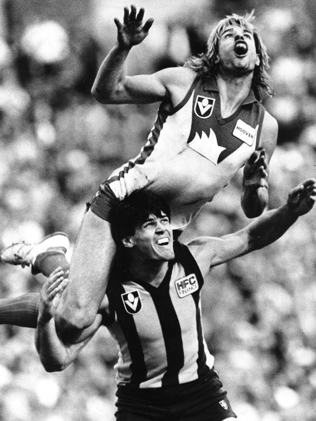 Capper soars for a mark in 1987.