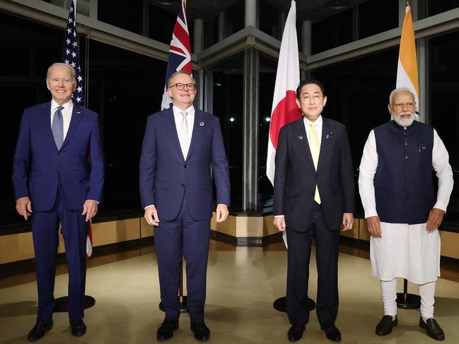 (L to R) US President Joe Biden, Australia's Prime Minister Anthony Albanese, Japan's Prime Minister Fumio Kishida and India's Prime Minister Narendra Modi pose for a photo as they hold a "Quad" meeting on the sidelines of the G7 Summit Leaders' Meeting on May 20, 2023. (Photo by JAPAN POOL / JIJI PRESS / AFP) / Japan OUT