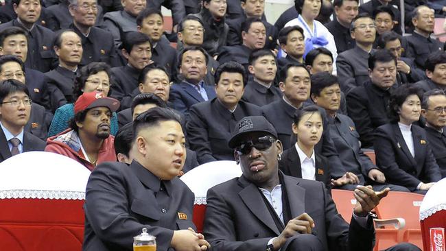 North Korean leader Kim Jong-un and former NBA star Dennis Rodman (front R) speaking at a basketball game in Pyongyang, 2013. Picture: AFP