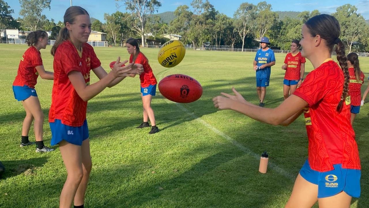 Gold Coast Suns Academy members Hayley Petersen and Evie Norton at a training session in Rockhampton.