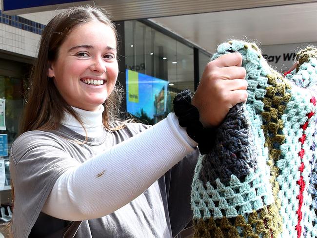 Alex Morse 20 (R) and housemate Harry Dear 24 (L) enjoy shopping at op shops like Salvos and Vinnies and have noticed a difference in pricing for similar items between the various stores, pictured outside the Vinnies store in Maroubra. Picture: Toby Zerna