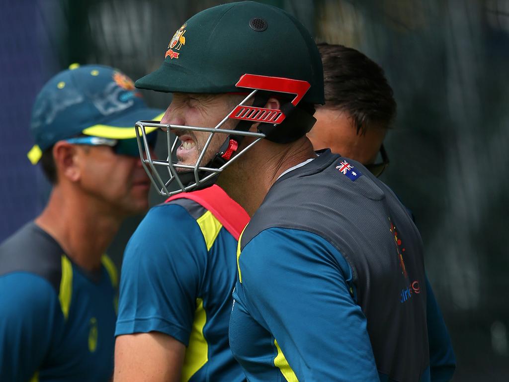 Shaun Marsh grimaces in pain after a net session.