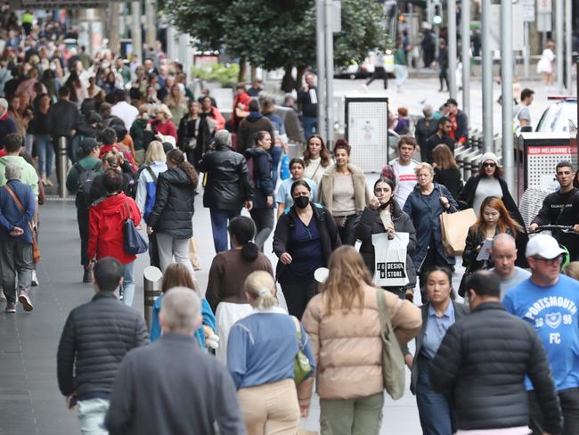 MELBOURNE, AUSTRALIA - NewsWire Photos, APRIL 20, 2021. Victoria has scrapped much of its remaining Covid rules with NSW expected to soon follow suit. Shoppers in the Bourke Street Mall in Melbourne. Picture: NCA NewsWire / David Crosling