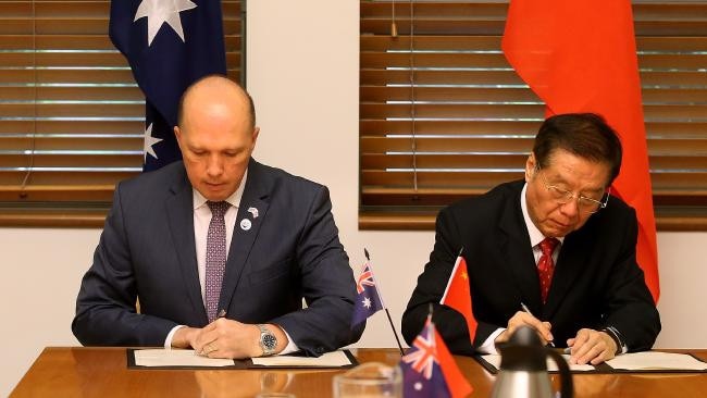 Minister for Immigration and Border Protection Peter Dutton and Minister of China's Customs Yu Guangzhou signed a landmark Mutual Recognition Arrangement between Australia and China. (Image: Kym Smith)