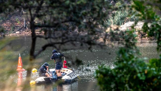 (File image: Police pictured on Lake Parramatta) The body of a man has been found in Lake Parramatta Reserve. Picture: Monique Harmer