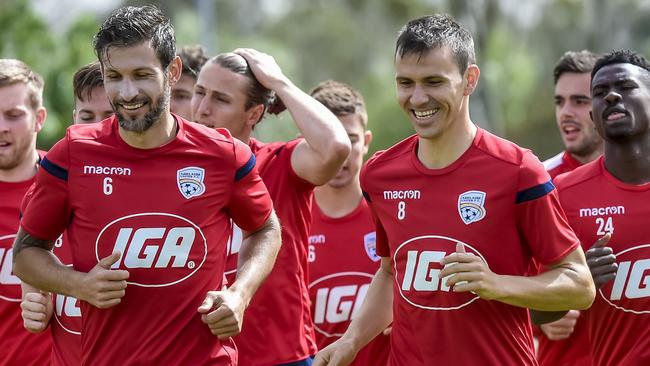 Adelaide United captain Isaias (right) has called on Reds fans to fill Hindmarsh Stadium for the club’s A-League opener. Picture: AAP Image/Roy VanDerVegt