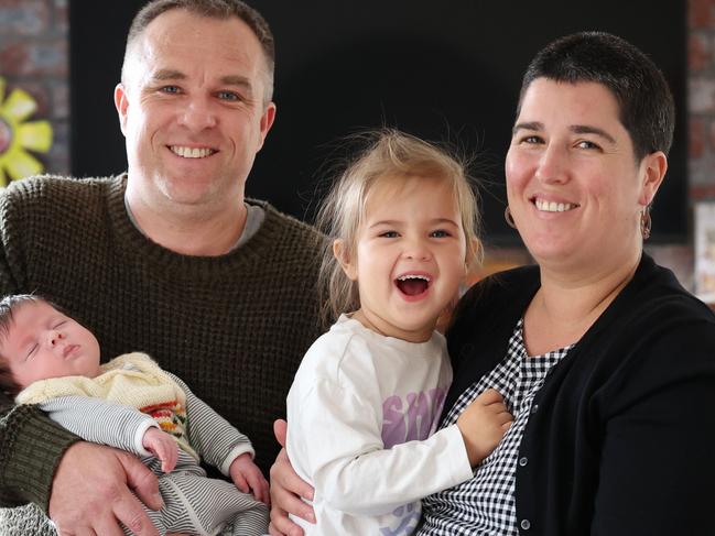 Rocio Albornoz with husband Oliver Carroll holding their son Liam, and daughter Ella, 2. Picture: David Caird