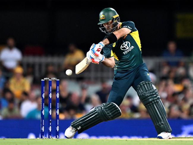 BRISBANE, AUSTRALIA - NOVEMBER 14: Glenn Maxwell of Australia plays a shot during game one of the Men's T20 International series between Australia and Pakistan at The Gabba on November 14, 2024 in Brisbane, Australia. (Photo by Bradley Kanaris/Getty Images)