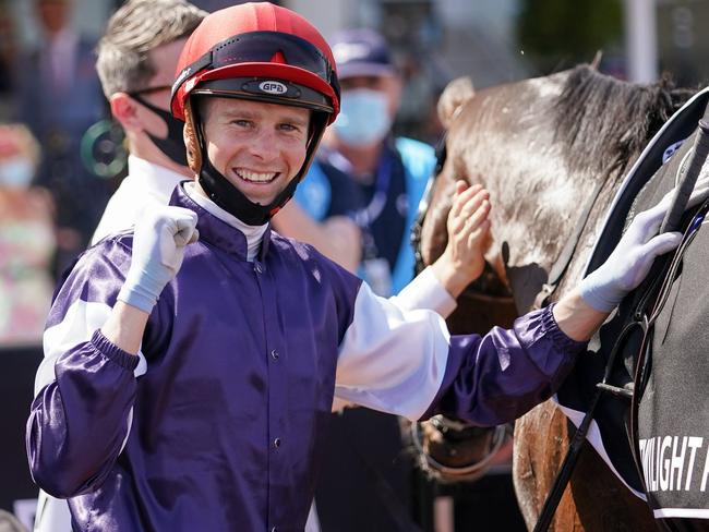 Jye McNeil returns to the mounting yard with Twilight Payment (IRE) after winning the Lexus Melbourne Cup at Flemington Racecourse on November 03, 2020 in Flemington, Australia. (Scott Barbour/Racing Photos via Getty Images)