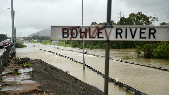 Flooding across Townsville. Lower Bridge closed on the Bohle River as overflow covers the road. Picture: Alix Sweeney